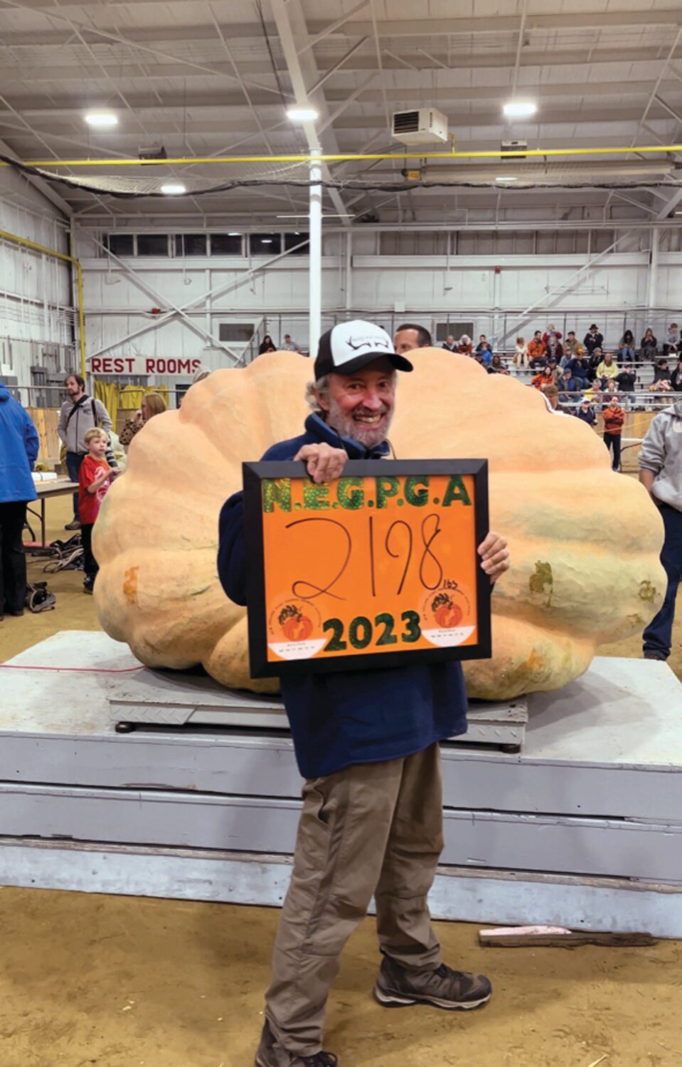 BLUE RIBBON: Steve Sperry recently placed first at the Topsfield Fair weigh-off with his whopping 2,198-pound pumpkin. The prize purse netted Sperry $6,500.